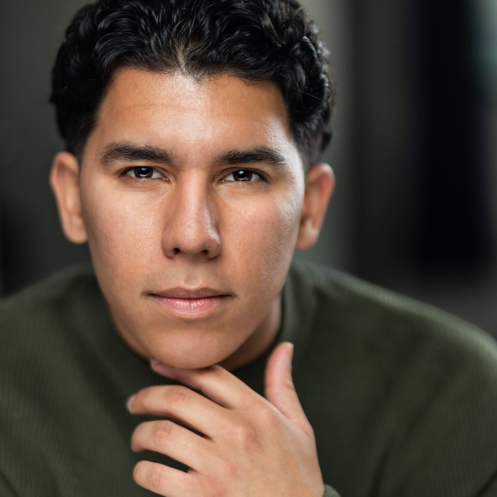 SEBASTIAN-QUINT-Headshot-Green-formal-hair-back-1-pdf